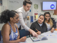 Former refugees tackling the road code through a ESOL road code class.