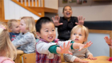 Children at desks.