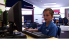Student using a computer.